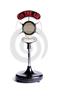 Photo of old microphone isolated on white