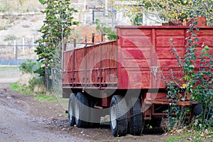 Photo of an old red trailer