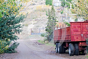 Photo of an old red trailer