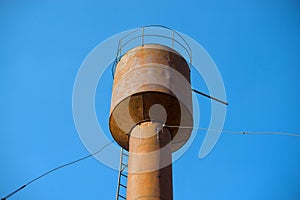 Photo of old rusty water tower