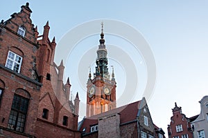Photo of the old town of Gdansk architecture in sunset light. Aerial shot. Channel and buildings - top view