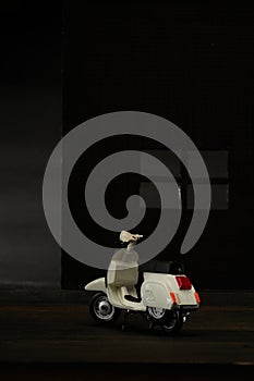 Photo of an old Vespa which is also called a scooter