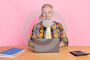 Photo of optimistic grey beard old man work wear shirt isolated on pink color background