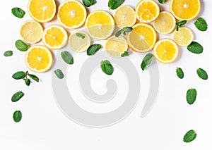 Photo of orange and lemon slices with mint on a white background. Background for the design of banners, websites, blogs,
