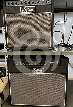 Photo of a Pair of 'Kustom Guitar Speaker/Amps in a Music Store