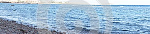 Photo panorama. Beautiful seascape of the Red Sea in the Gulf of Aqaba. Dahab, South Sinai Governorate, Egypt