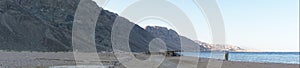 Photo panorama. Beautiful seascape of the Red Sea in the Gulf of Aqaba. Dahab, South Sinai Governorate, Egypt