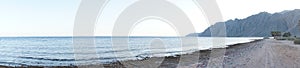 Photo panorama. Beautiful seascape of the Red Sea in the Gulf of Aqaba. Dahab, South Sinai Governorate, Egypt