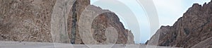 Photo panorama. Gorgeous landscape on the tourist route in the vicinity of Malakot Mountain oasis. Dahab, Egypt