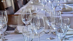 Photo Panorama Tableware arranged on round table with white cloth for eating at an occasion