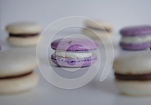 Photo of pastel purple and white macaroons photo