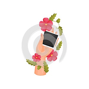 Photo poloroid in hand, decorated with flowers. Vector illustration on white background.