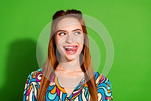 Photo portrait of attractive woman tongue lick teeth lips look empty space dressed stylish retro clothes isolated on