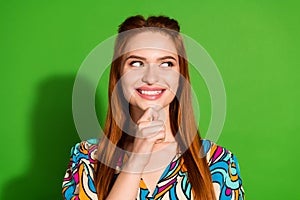 Photo portrait of attractive young woman look minded empty space dressed stylish retro clothes  on green color