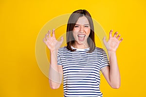 Photo portrait of funky young lady fooling show fingers claws growl tiger wear stylish striped garment isolated on