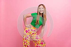 Photo portrait of pretty teenager girl posing defile shopping promo wear trendy green outfit  on pink color