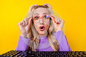 Photo portrait of pretty young girl keyboard touch specs astonished reaction wear trendy purple clothes isolated on