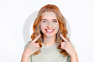 Photo portrait of red haired woman pointing fingers at smile white teeth isolated white color background