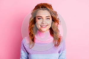 Photo portrait of smiling foxy woman isolated on pastel pink colored background