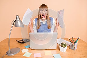 Photo portrait of woman shouting crazy lot of work overwhelmed keeping papers documents deadlines isolated on pastel