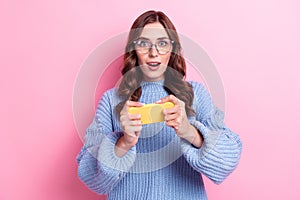 Photo of positive crazy addicted shocked video gamer woman wear glasses hold her smartphone online gift from app