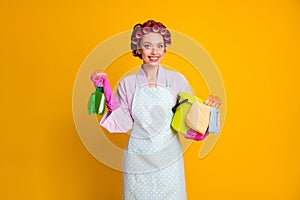 Photo of positive girl hold sprayer bottle bucket wear bath robe gloves isolated bright color background