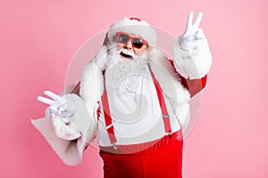 Photo of positive grey beard fat santa claus enjoy x-mas jolly holly event make v-sign wear suspenders pants gloves