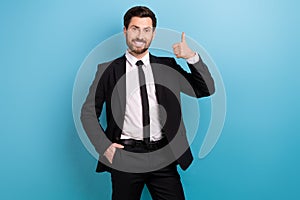 Photo of positive happy coach wear black tuxedo showing thumb up isolated blue color background
