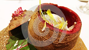 A pot from beetroot and herring. Snack