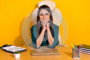 Photo of pretty charming lady dressed green shirt glasses working office  yellow color background