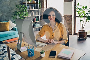 Photo of pretty charming lady freelancer wear shirt smiling texting modern device indoors workplace workstation