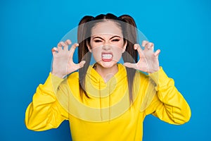 Photo of pretty crazy lady two tails hairdo raise arms showing claws grinning evil irritated annoyed person wear casual