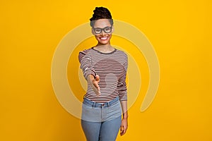 Photo of pretty friendly person raise give arm handshake you isolated on yellow color background