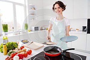 Photo of pretty housewife lady put grilled salmon trout fillet steak flying pan on plate ready roasted condition cook