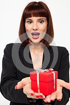 photo pretty woman posing with red gift box surprise Lifestyle unaltered