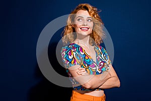 Photo of pretty young woman look empty space wear top isolated on dark blue color background