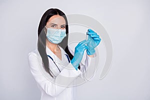 Photo of professional confident doc lady ready for operation young surgeon hold anesthesia syringe wear mask gloves