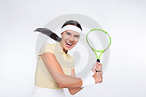 Photo of professional tennis player woman hold racket game excited isolated on grey color background