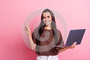 Photo of programmer young woman brunette hair model promoting new useful software direct finger copy space isolated on