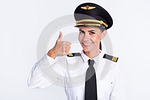 Photo of promoter pilot lady raise thumb up wear hat aviator uniform isolated white color background