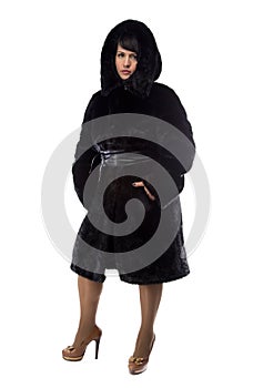 Photo of pudgy brunette in black coat