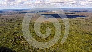 Photo from a quadrocopter of a magic lake in the taiga of Russia