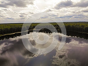 Photo from a quadrocopter of a magic lake in the taiga of Russia