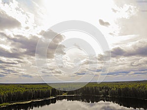 Photo from a quadrocopter of a magic lake in the taiga of Russia