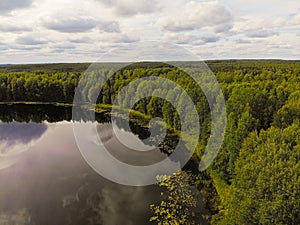 Photo from a quadrocopter of a magic lake in the taiga of Russia