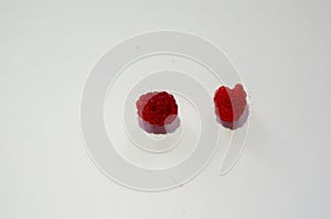 Photo of raspberries on a white background