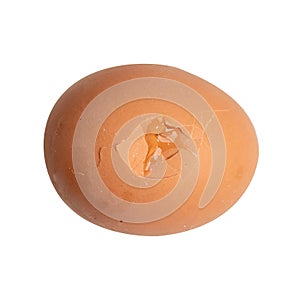 The Photo of a raw egg shell cracking