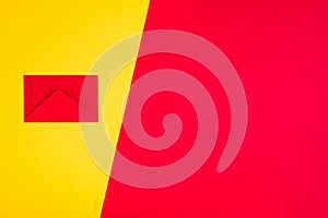 Photo of red letter wrriten to santa claus isolated over divided yellow bright color background