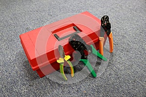 Photo of a red toolbox full of tools for workers