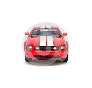 Photo of red toy model car isolated on white background